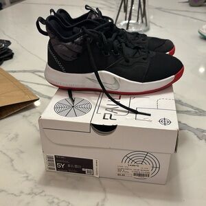 Worn once boys Nike paul George black metallic sneakers size 5! With box!